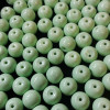 Perles en verre unies vert menthe