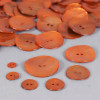 Bouton en nacre deux trous orange foncé