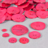 Bouton en nacre deux trous fuschia