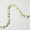 Perles nacrées goutte 12 x 10mm ecru x1