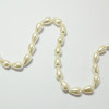 Perles nacrées goutte 14 x 8mm ecru x1