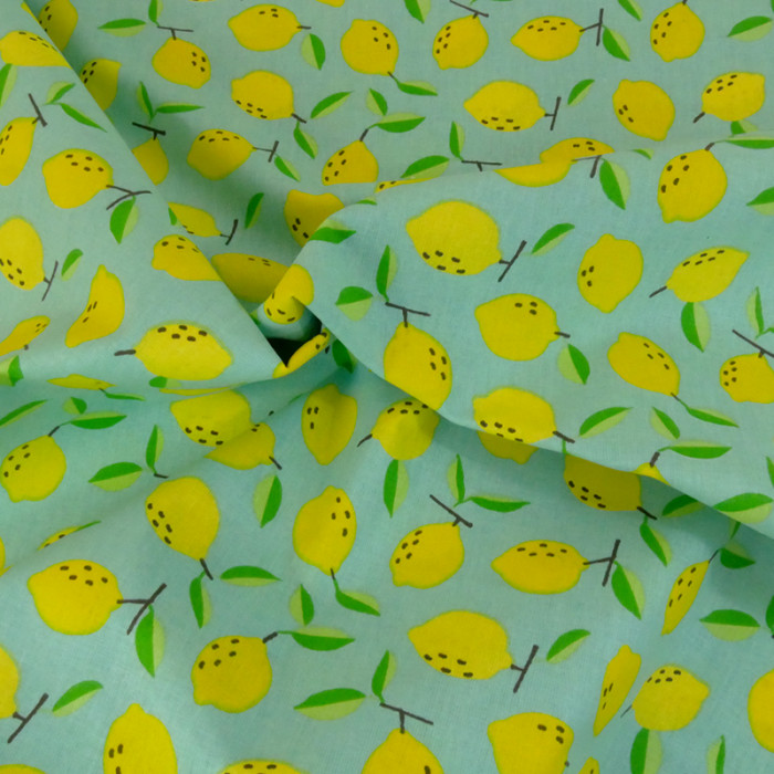 Tissu coton cretonne citrons - vert x 10 cm