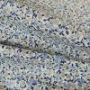 Tissu coton enduit fleurs - bleu blanc x 10 cm