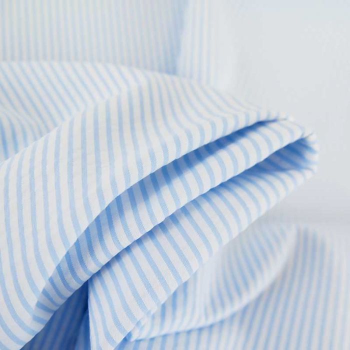 Tissu seersucker rayures haute couture - bleu clair x 10 cm