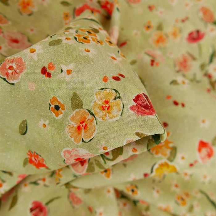 Tissu soie jardin fleuri haute couture - vert pâle x 10 cm