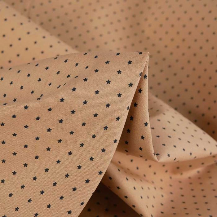 Tissu coton élasthanne beige étoiles noires - Fibre Mood x 10 cm
