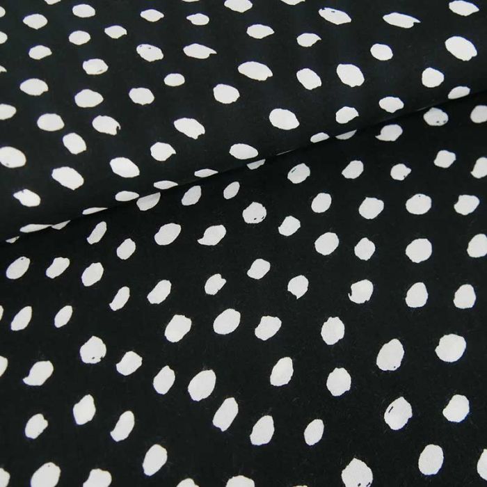 Tissu viscose pois blancs haute couture - noir x 10 cm
