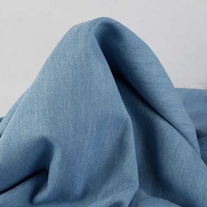 Tissu jean denim haute couture - bleu clair x 10 cm