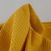 Tissu piqué de coton nid d'abeille - moutarde x 10 cm