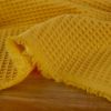 Tissu piqué de coton nid d'abeille - moutarde x 10 cm