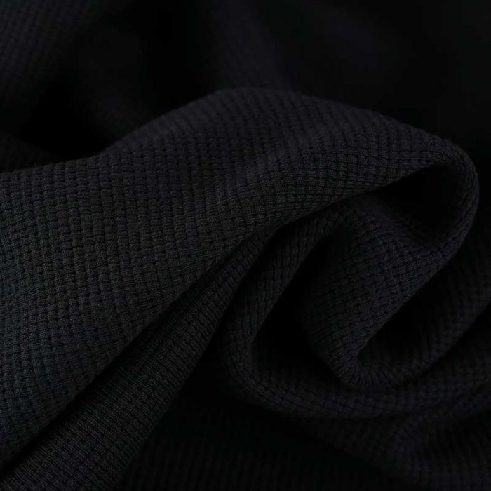 Tissu jersey coton gaufré - noir x 10 cm