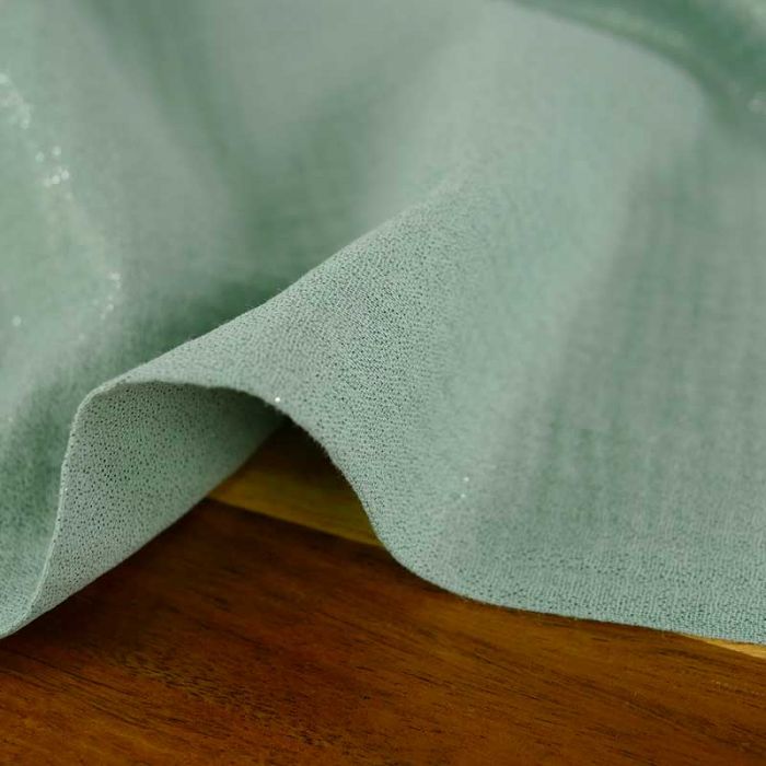 Tissu double gaze pailletée - vert de gris x 10 cm