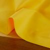 Tissu coton popeline bio - jaune x 10 cm
