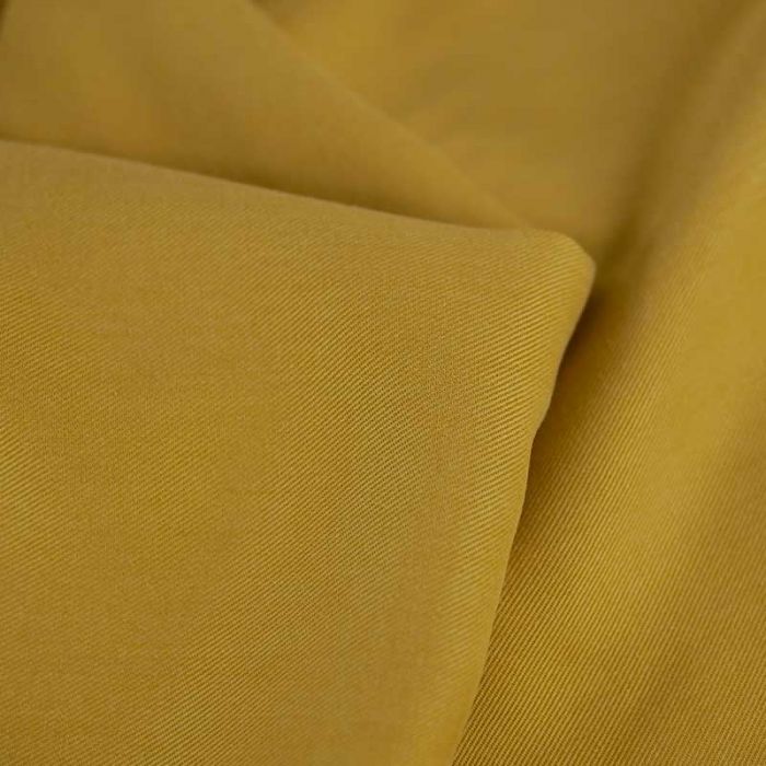 Tissu tencel haute couture - jaune ocre  x 10 cm