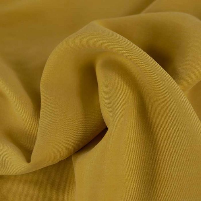 Tissu tencel haute couture - jaune ocre  x 10 cm