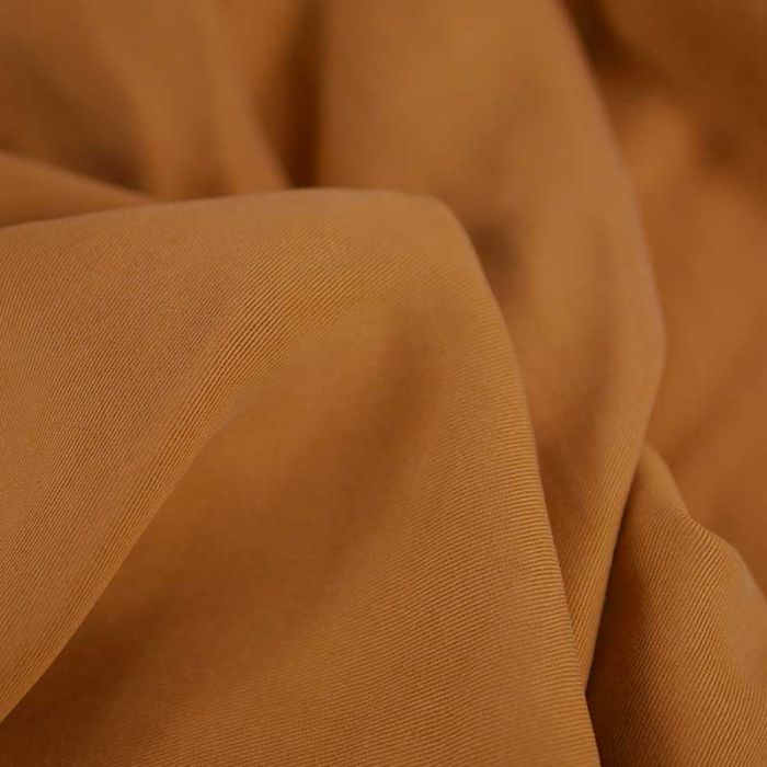 Tissu tencel haute couture - orange ocre x 10 cm