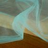 Tissu tulle brillant uni - turquoise x 10 cm