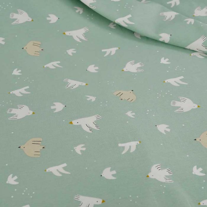 Tissu jersey coton oeko-tex oiseaux blancs - vert de gris x 10 cm