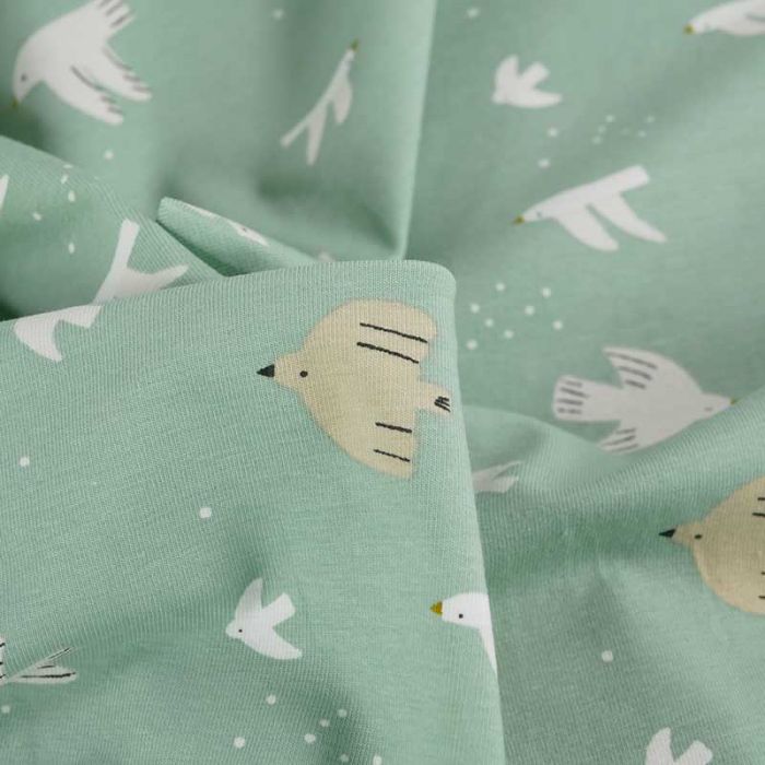 Tissu jersey coton oeko-tex motifs oiseaux - vert de gris x 10 cm