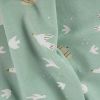 Tissu jersey coton oeko-tex oiseaux blancs - vert de gris x 10 cm