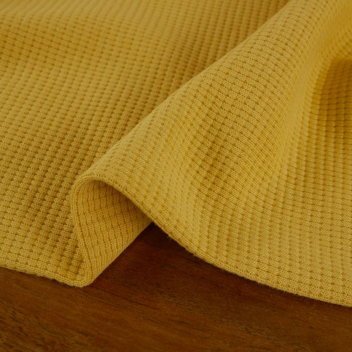 Tissu jersey coton gaufré - jaune blé x 10 cm
