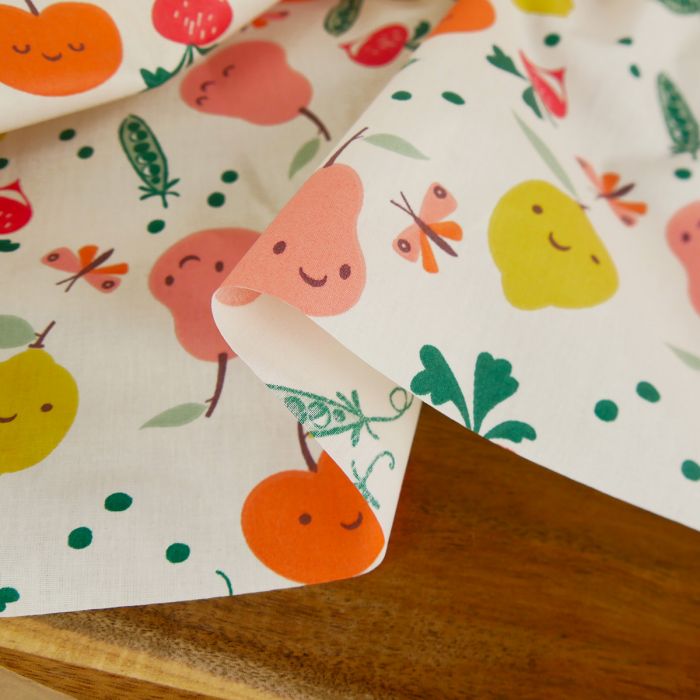Tissu coton enduit fruits et légumes - écru x 10 cm