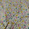 Tissu batiste de coton à fleurs violet - vert x 10 cm