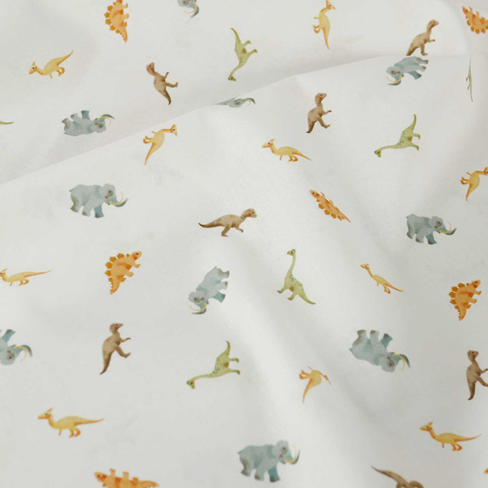 Tissu popeline coton dinosaures - blanc x 10 cm