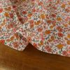 Tissu jersey fin fleurs Jollia - orange x 10 cm