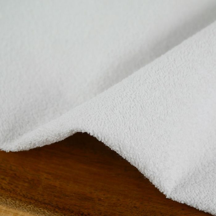 Tissu alèse imperméable - blanc x 10 cm