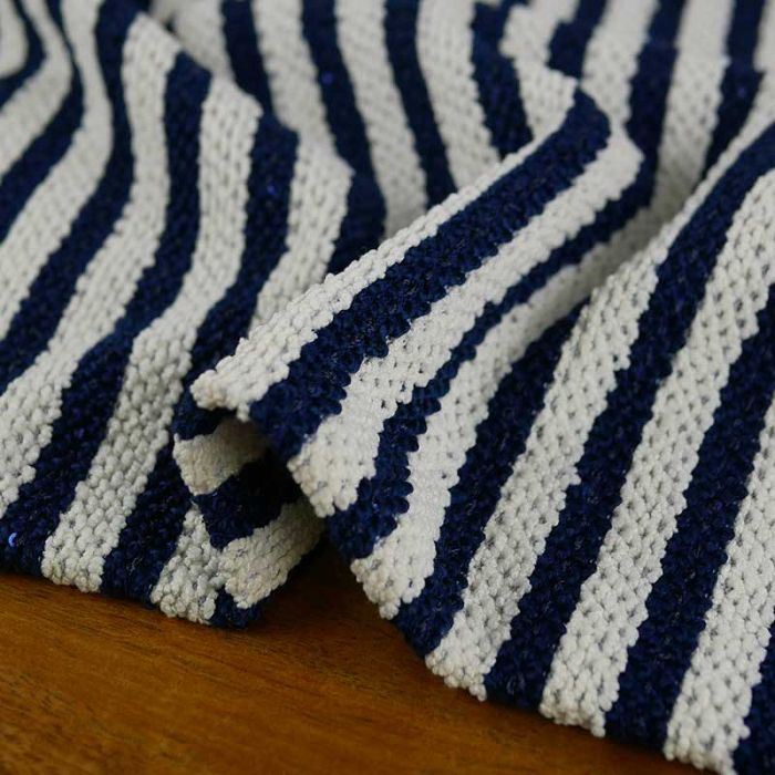 Tissu jersey maille marinière sequins - bleu marine x 10 cm