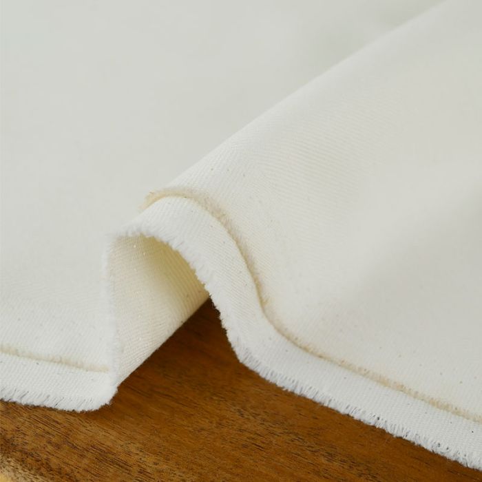 Tissu denim stretch haute couture - écru x 10 cm