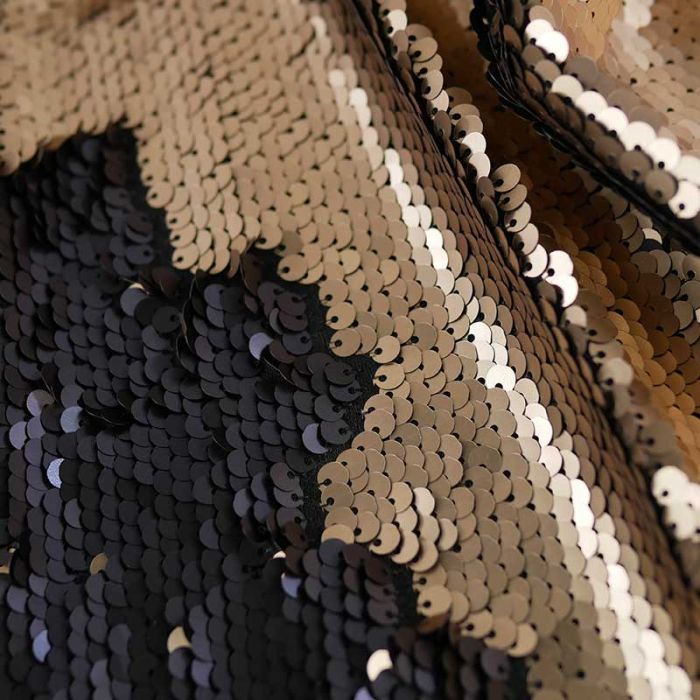 Tissu jersey sequins réversibles haute couture noir - doré x 10 cm