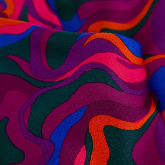Tissu crêpe satiné polyester psychédélique - violet x 10 cm