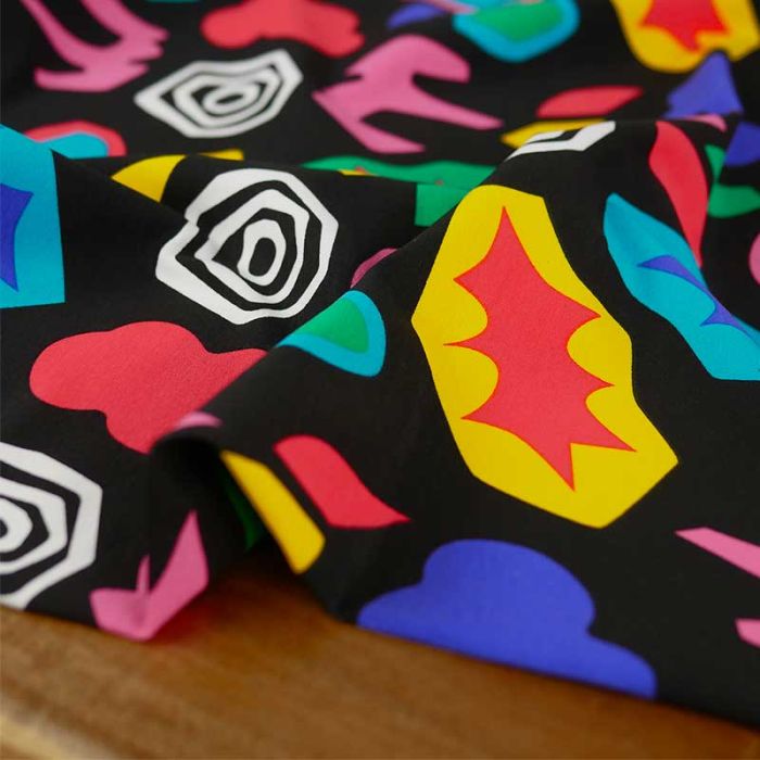 Tissu jersey sweat léger pop art multicolore - noir x 10 cm