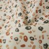 Tissu coton enduit léopard marron - écru x 10 cm