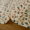Tissu coton enduit léopard marron - écru x 10 cm