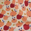 Tissu coton enduit pommes et mandarines - écru x 10 cm