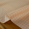 Tissu coton enduit carreaux blancs - rose nude x 10 cm
