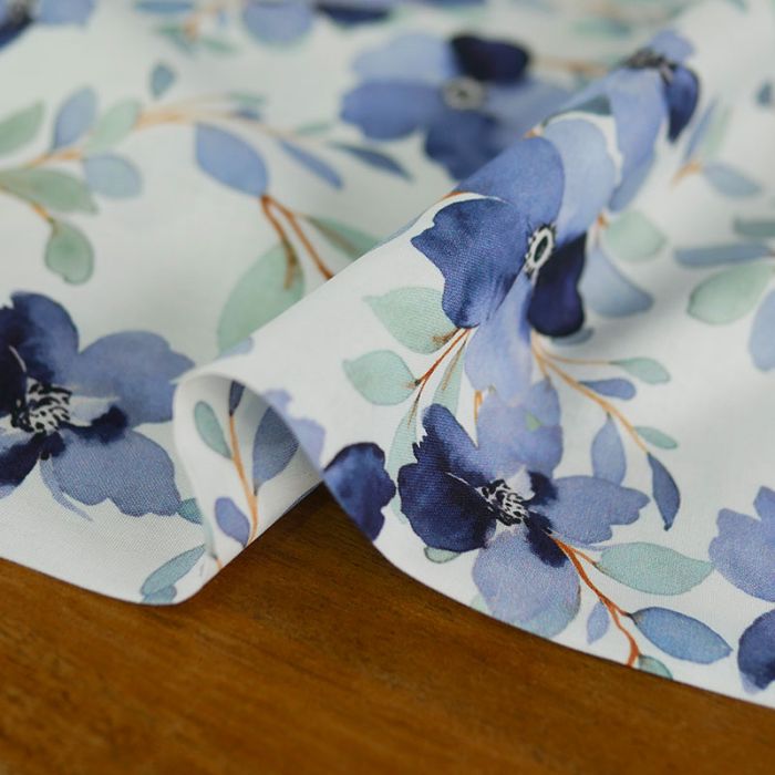 Tissu popeline coton fleurs bleues - blanc x 10 cm