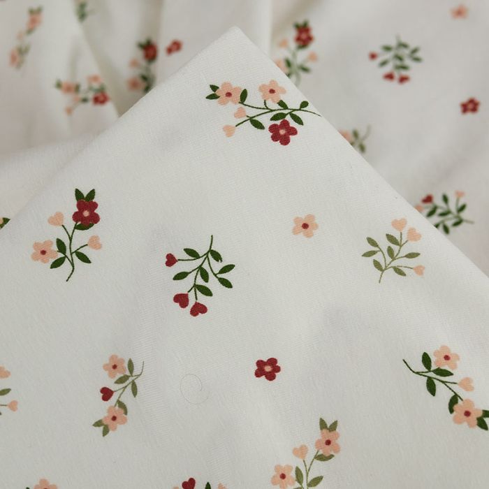 Tissu jersey fin bouquets de fleurs - écru x 10 cm