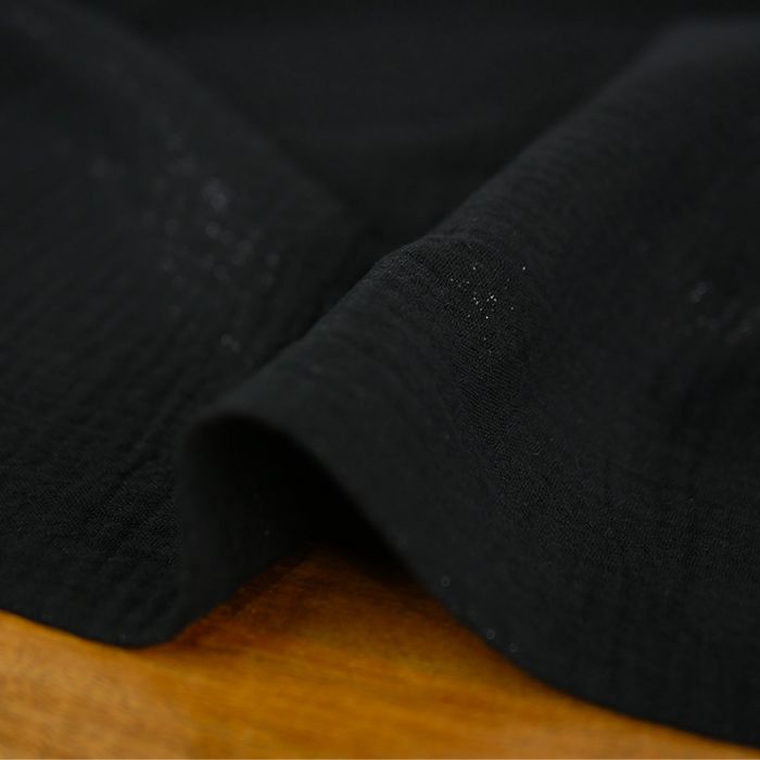 Tissu double gaze pailletée - noir x 10 cm