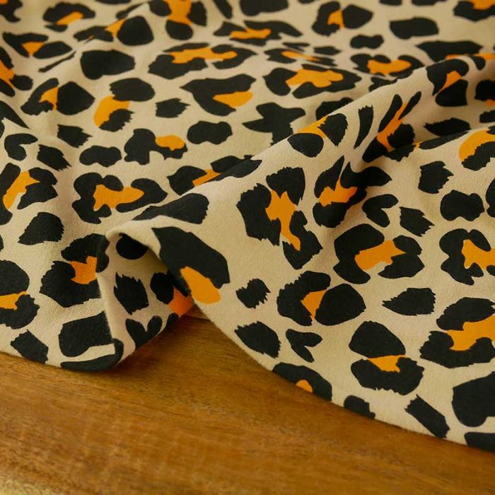 Tissu jersey fin coton léopard - beige x 10 cm