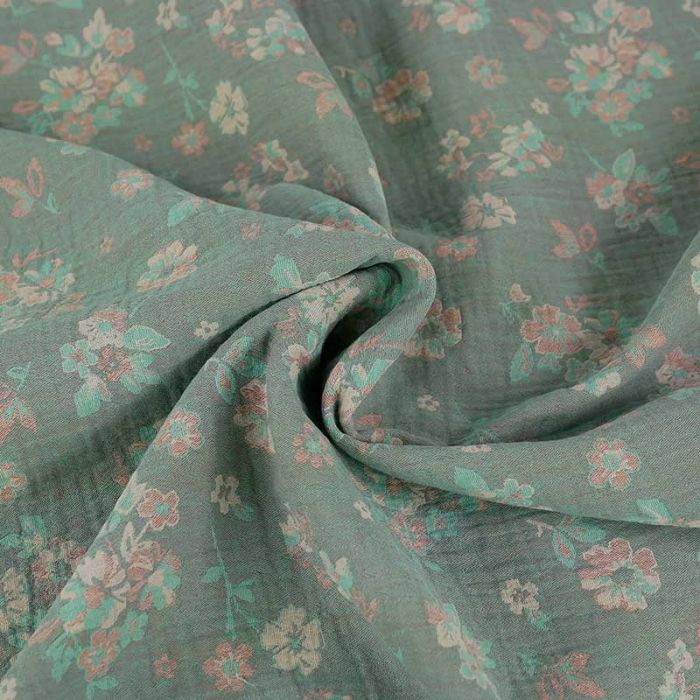 Tissu double gaze jacquard motifs fleurs - vert de gris x 10 cm