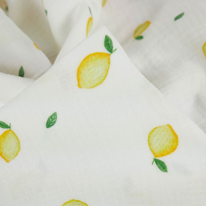 Tissu double gaze citrons jaunes - blanc x 10 cm