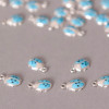 Breloque coccinelle bleu ciel x1