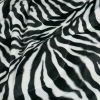 Tissu velours fausse fourrure zèbre - blanc cassé x 10 cm