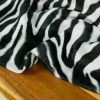 Tissu velours fausse fourrure zèbre - blanc cassé x 10 cm