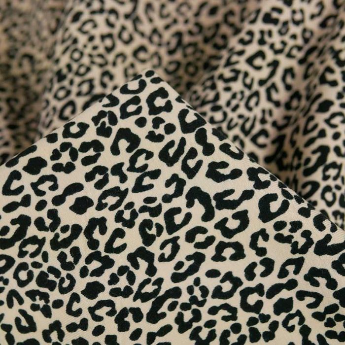 Tissu jersey fin petits motifs léopard - beige x 10 cm