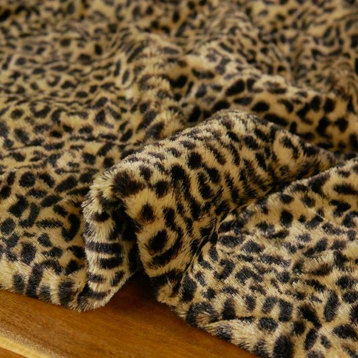 Tissu fausse fourrure matelassé léopard haute couture - marron x 10 cm